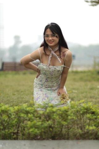 Breathtaking Asian babe with glasses Julia poses in her dress & heels outside