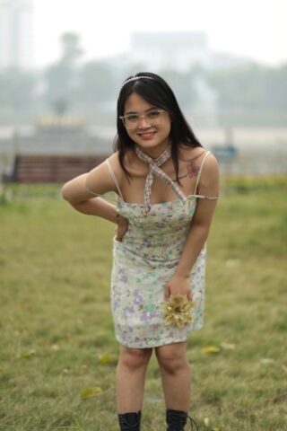 Breathtaking Asian babe with glasses Julia poses in her dress & heels outside