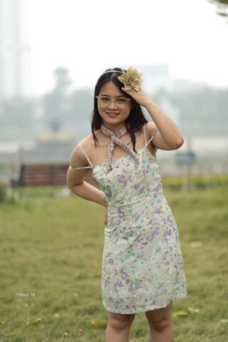 Breathtaking Asian babe with glasses Julia poses in her dress & heels outside