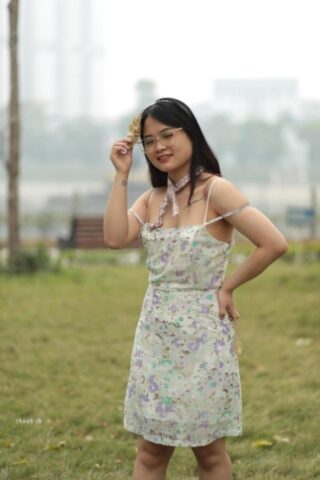 Breathtaking Asian babe with glasses Julia poses in her dress & heels outside
