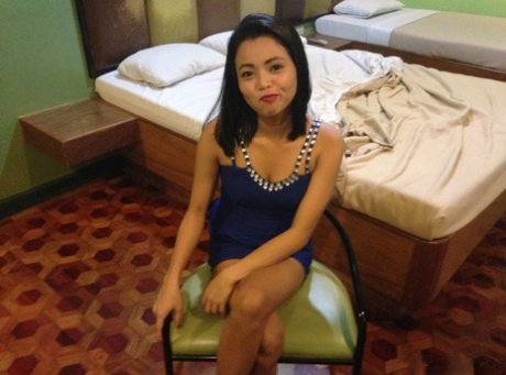 54353331_009_bf65 Petite Filipina teen makes her porn debut with a hard fuck on motel bed