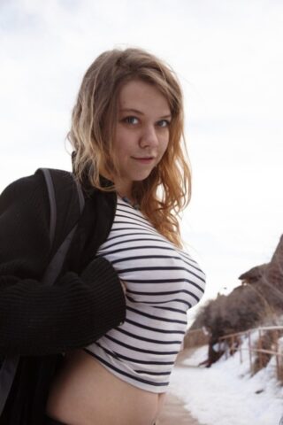 67478785_034_90b7 Amateur teen Hilary Craig exposes her tits and squeezes them on a winter day