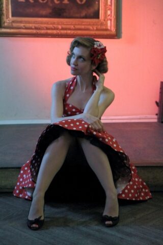41695775_002_e02f Glamorous pinup girl posing in her beautiful dress & heels in a solo